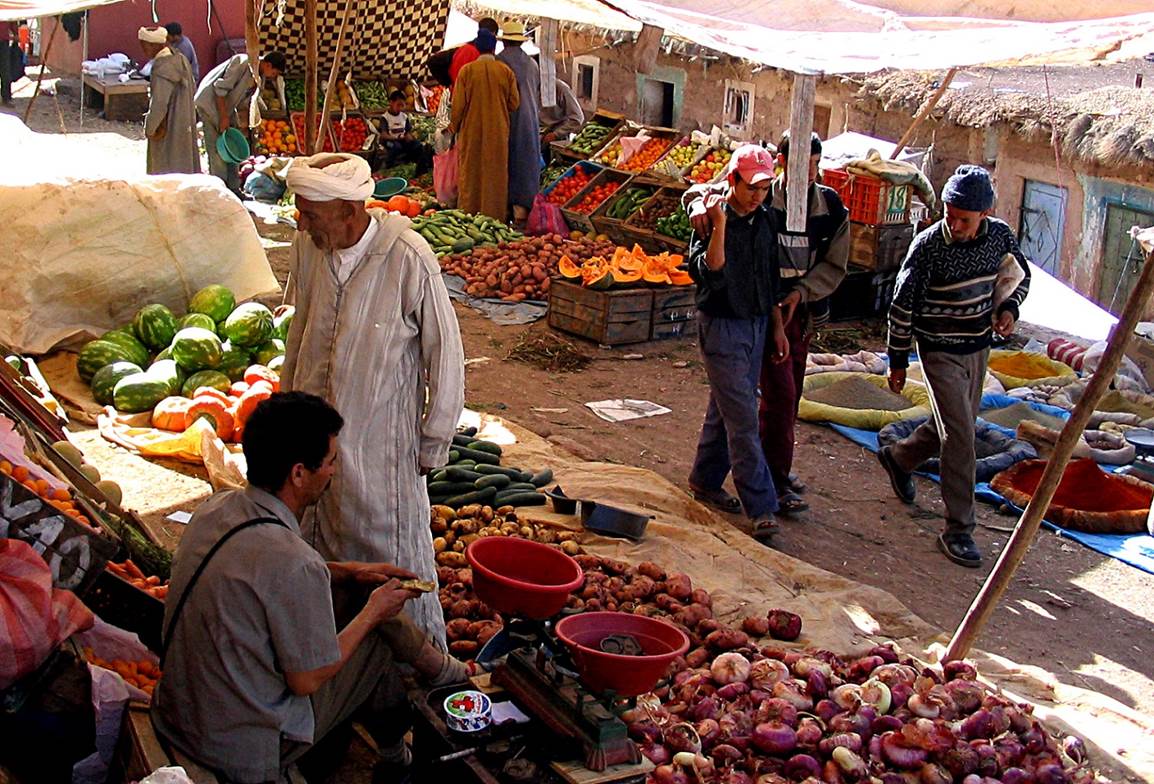A group of people at a market

Description automatically generated with low confidence