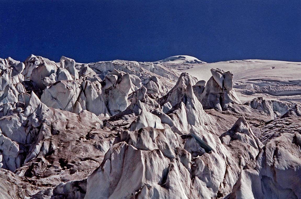 A close-up of a snowy mountain

Description automatically generated