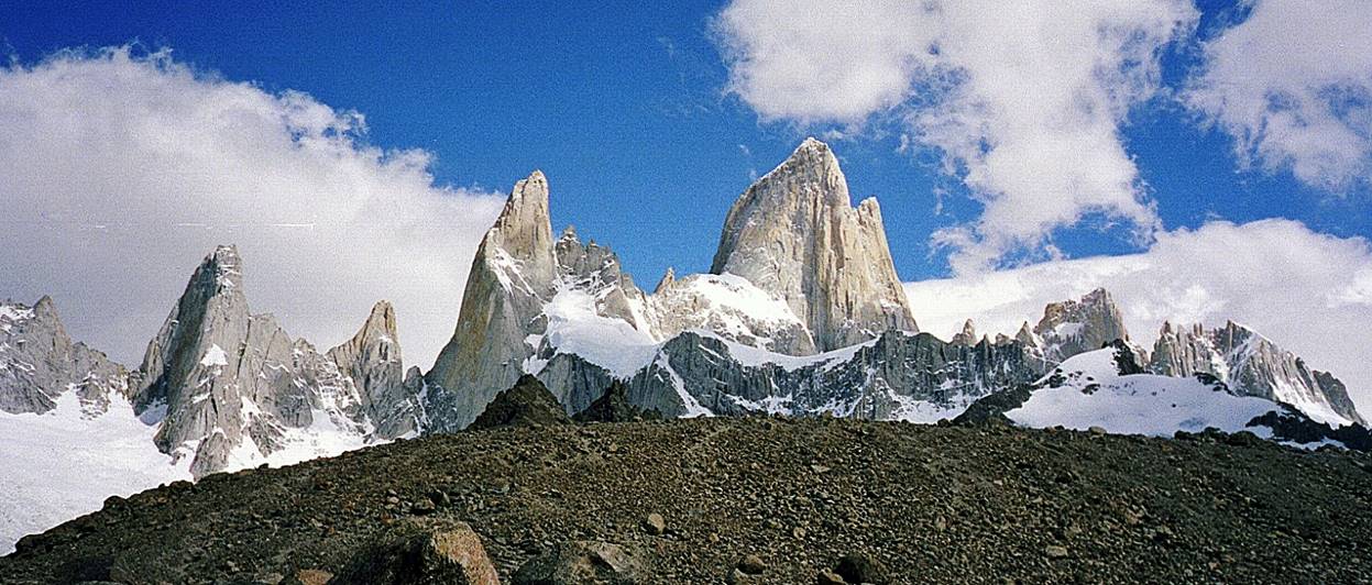Fitz Roy range with snow on top

Description automatically generated
