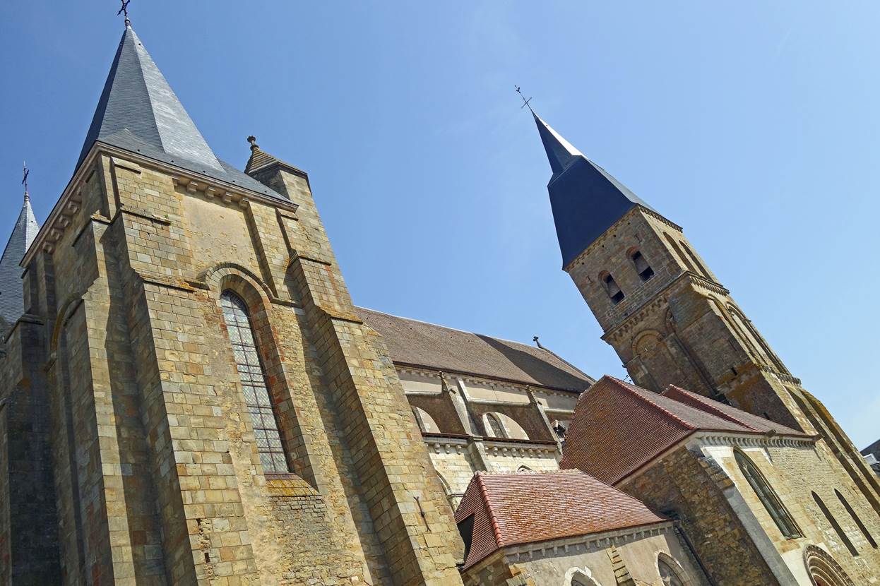 A low angle view of a church

Description automatically generated