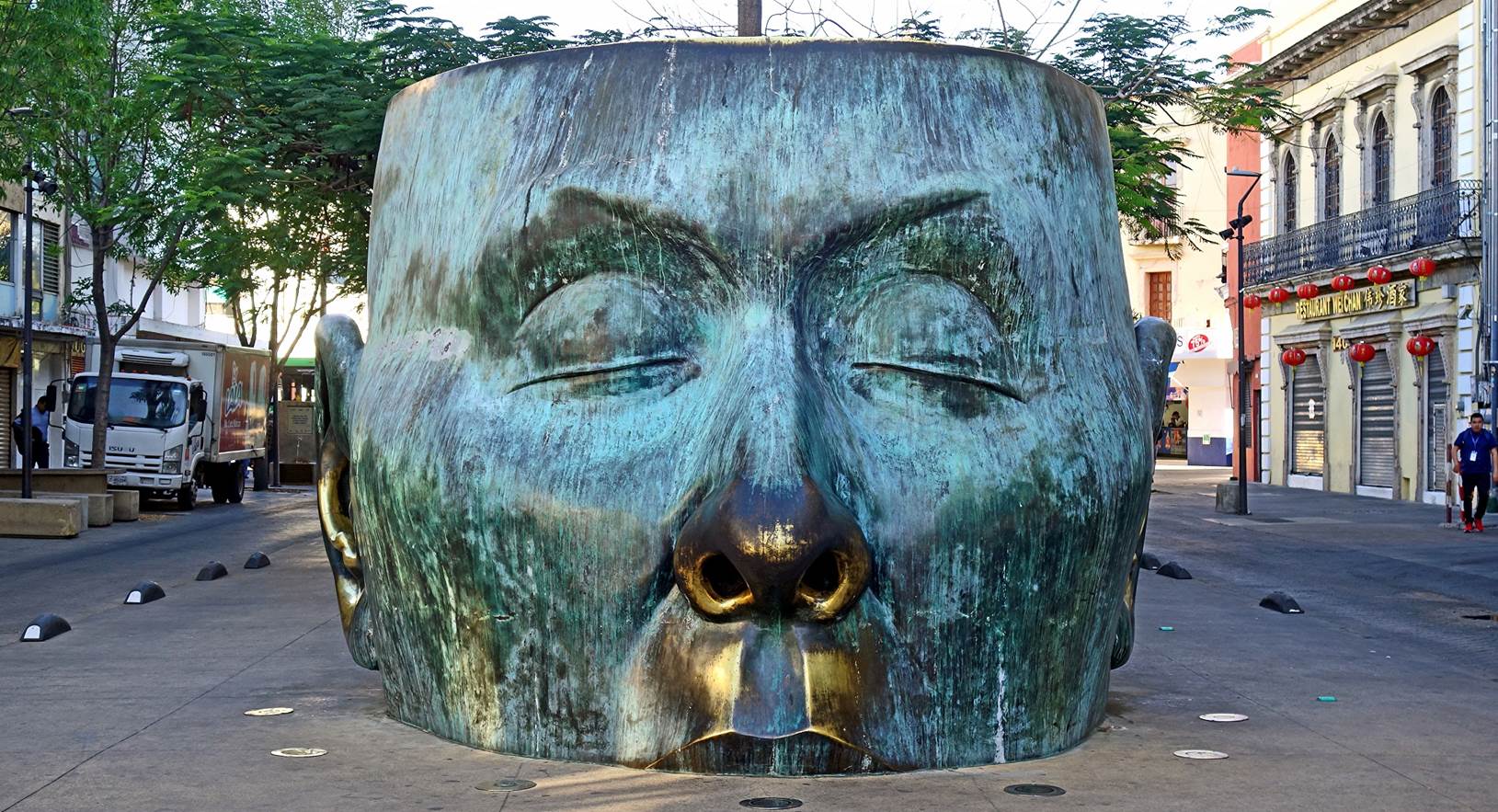A large statue of a face

Description automatically generated