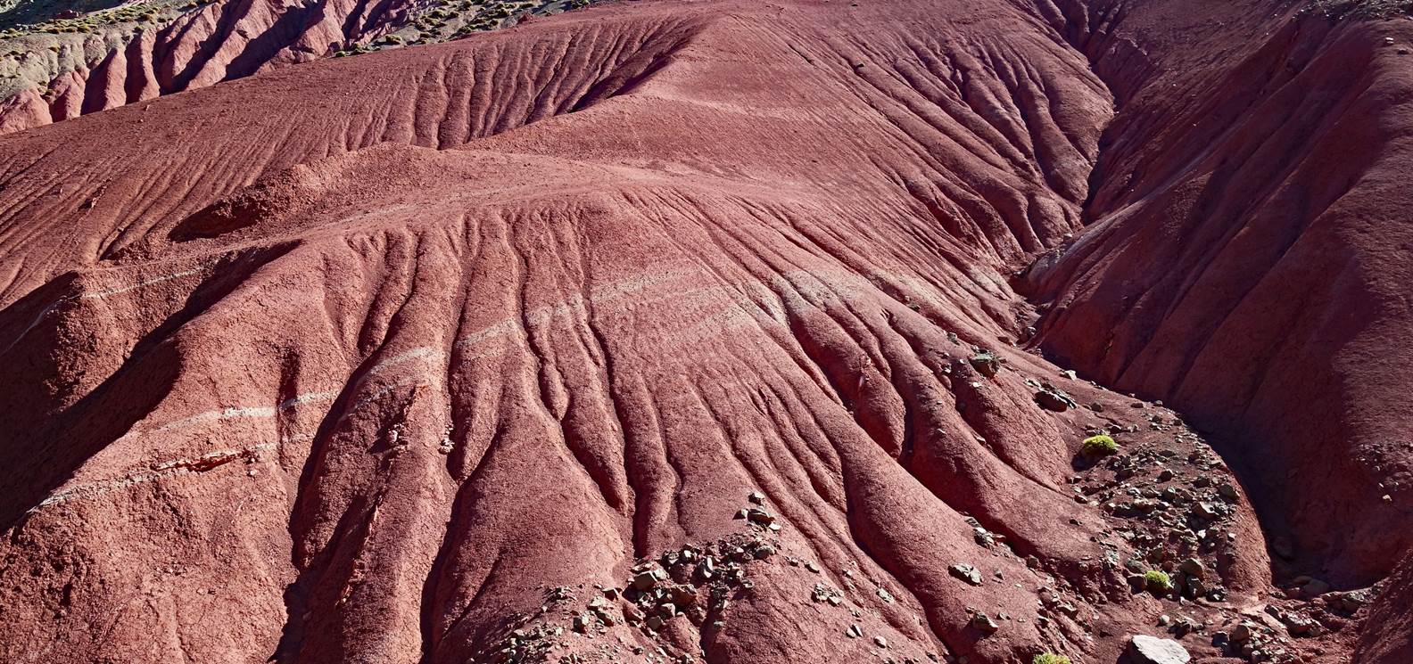 A close-up of a red mountain

Description automatically generated with low confidence
